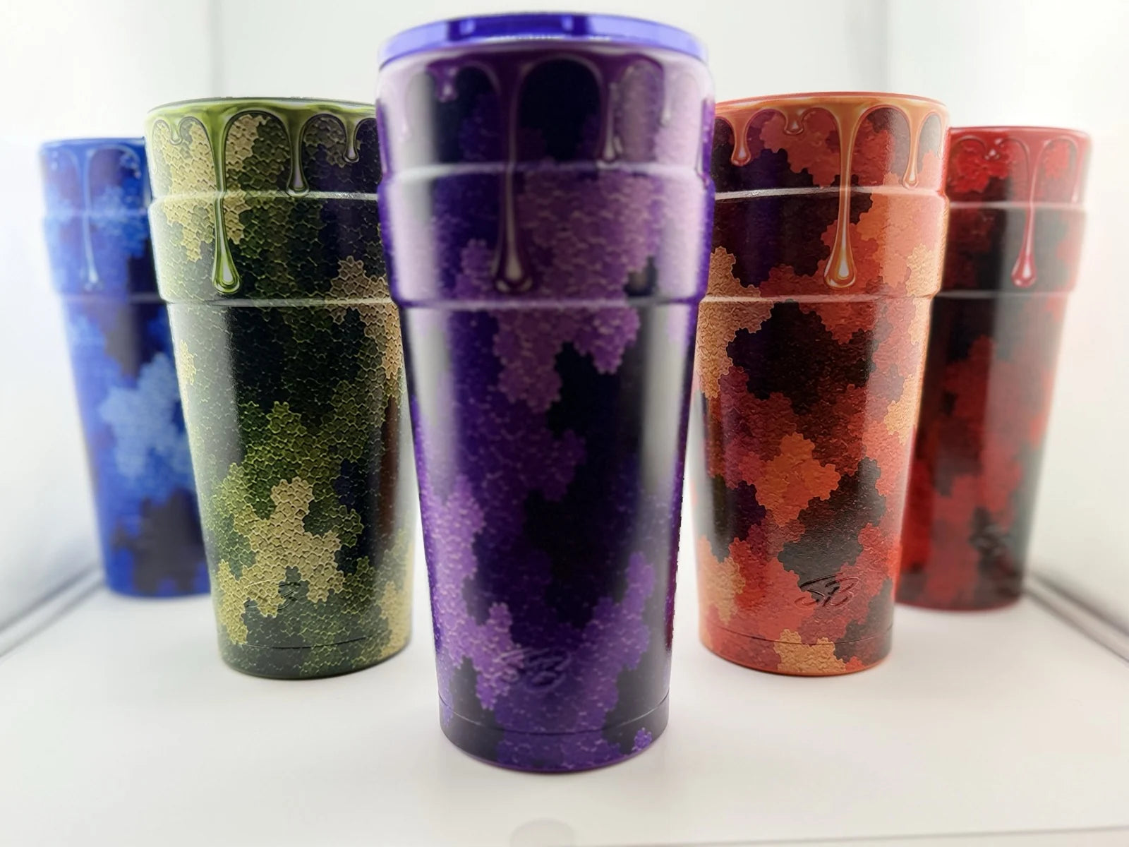 Five Camo Drip Double Cup colorways shown together