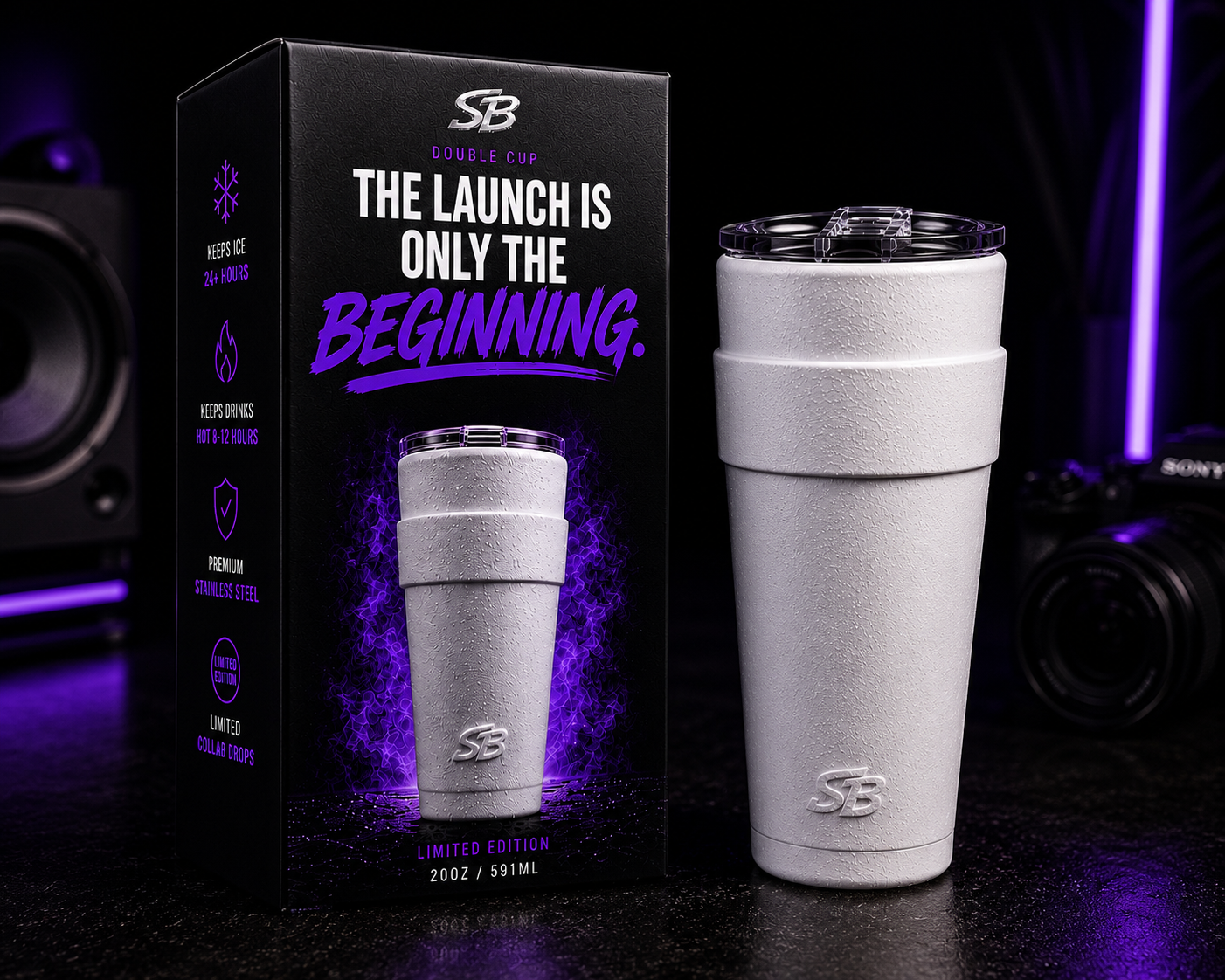 Sippers Only launch box beside a white tumbler under purple lighting